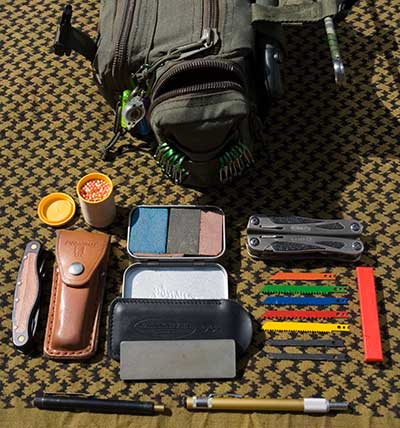 Grab bag. Right end pocket contents -   Gary Waidson - Ravenlore Bushcraft and Wilderness skills.