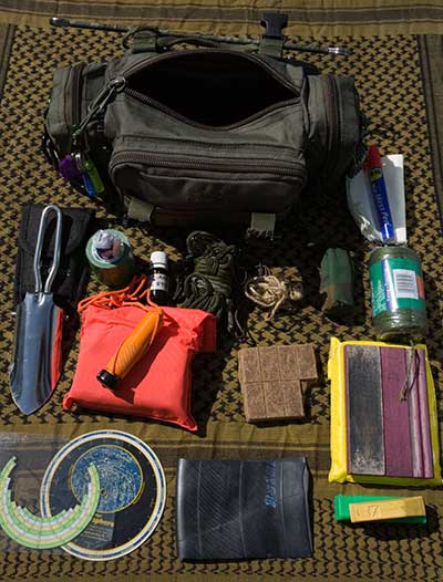 Grab bag. Main compartment contents. -   Gary Waidson - Ravenlore Bushcraft and Wilderness skills.