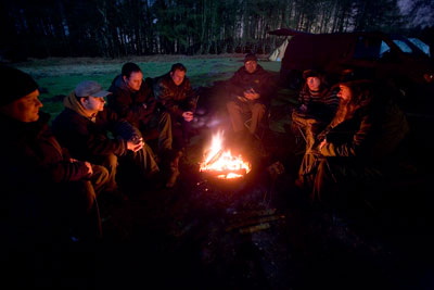 The fireside banter at a bushcraft skills weekend.  -  2017 - Gary Waidson - Ravenlore