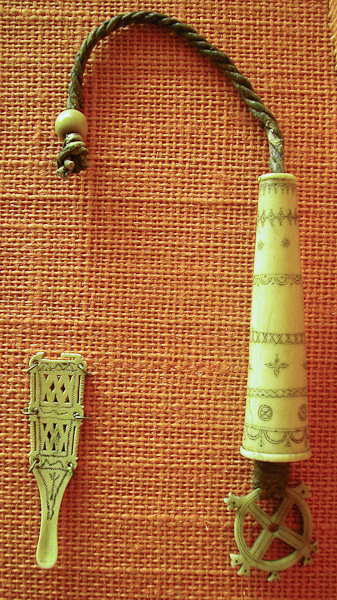 Saami needle case and ear spoon